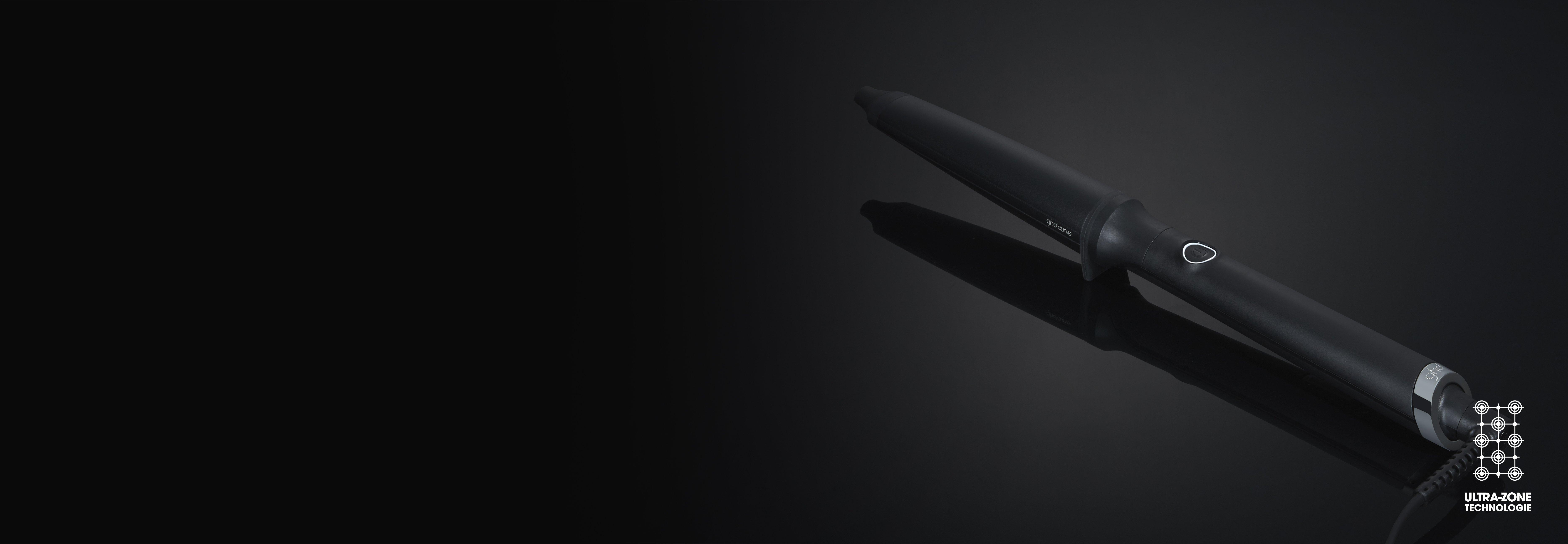 ghd curve® creative curl wand auf dunklem Hintergrund