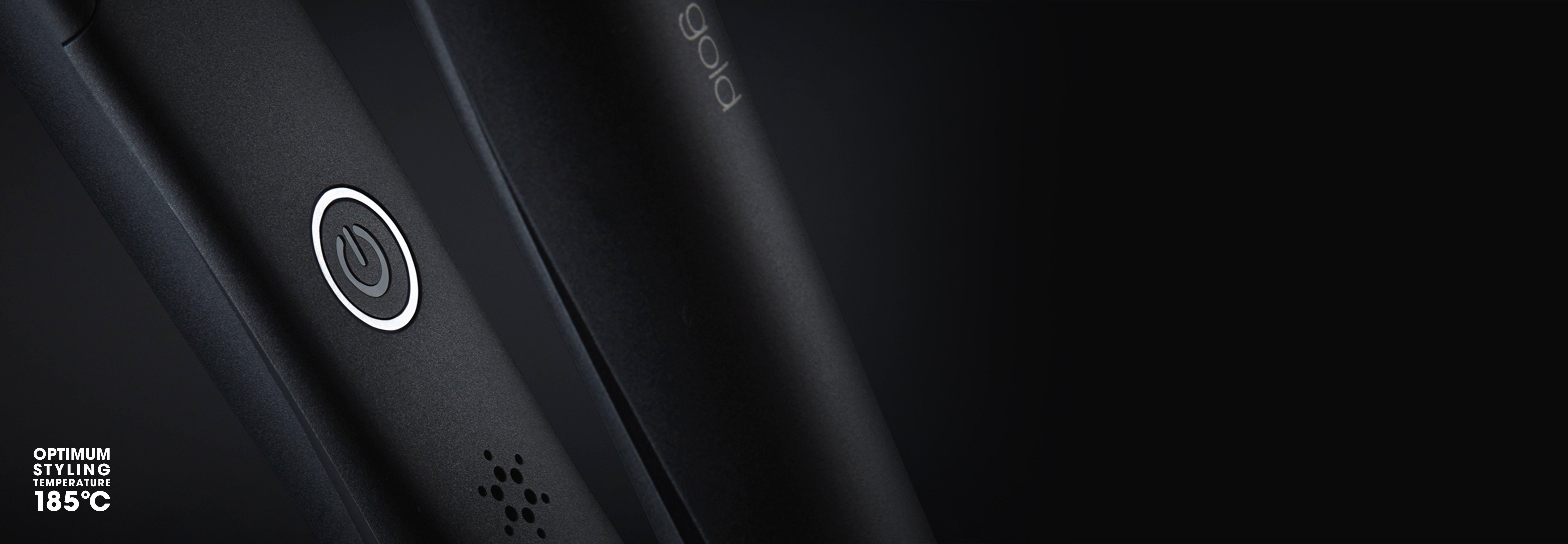 ghd gold styler close up of button and icon to show optimum temperature of 185 degrees