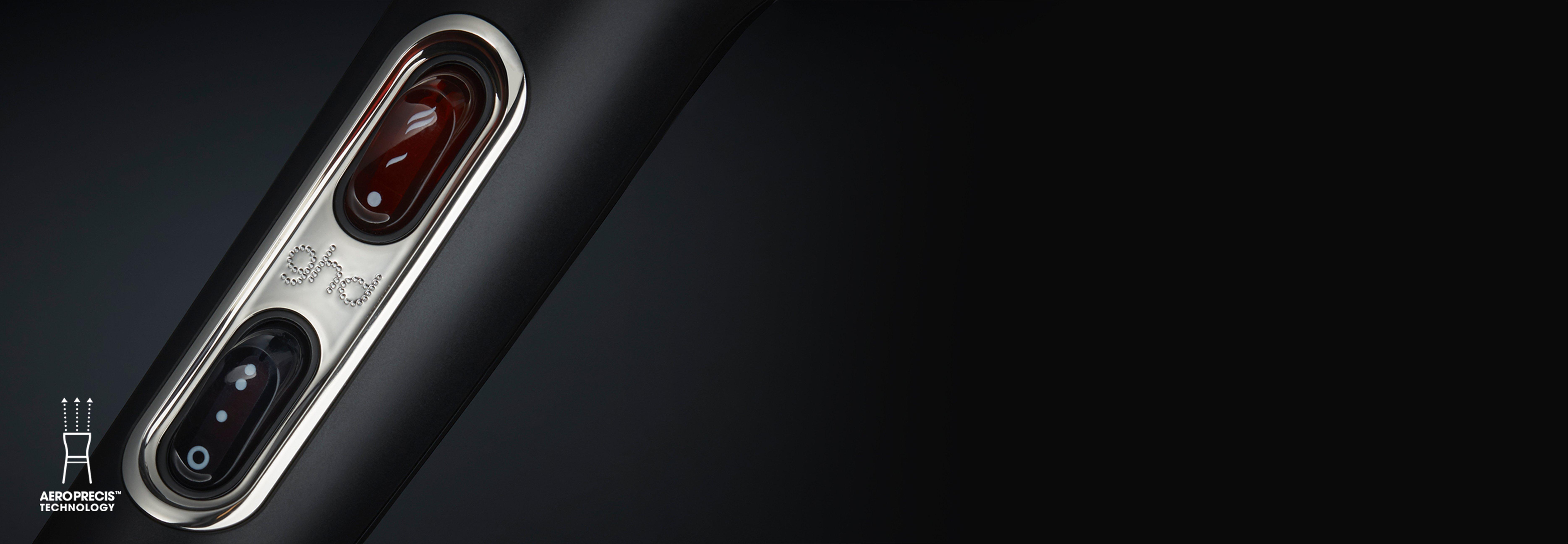 ghd helios hair dryer in black button close-up