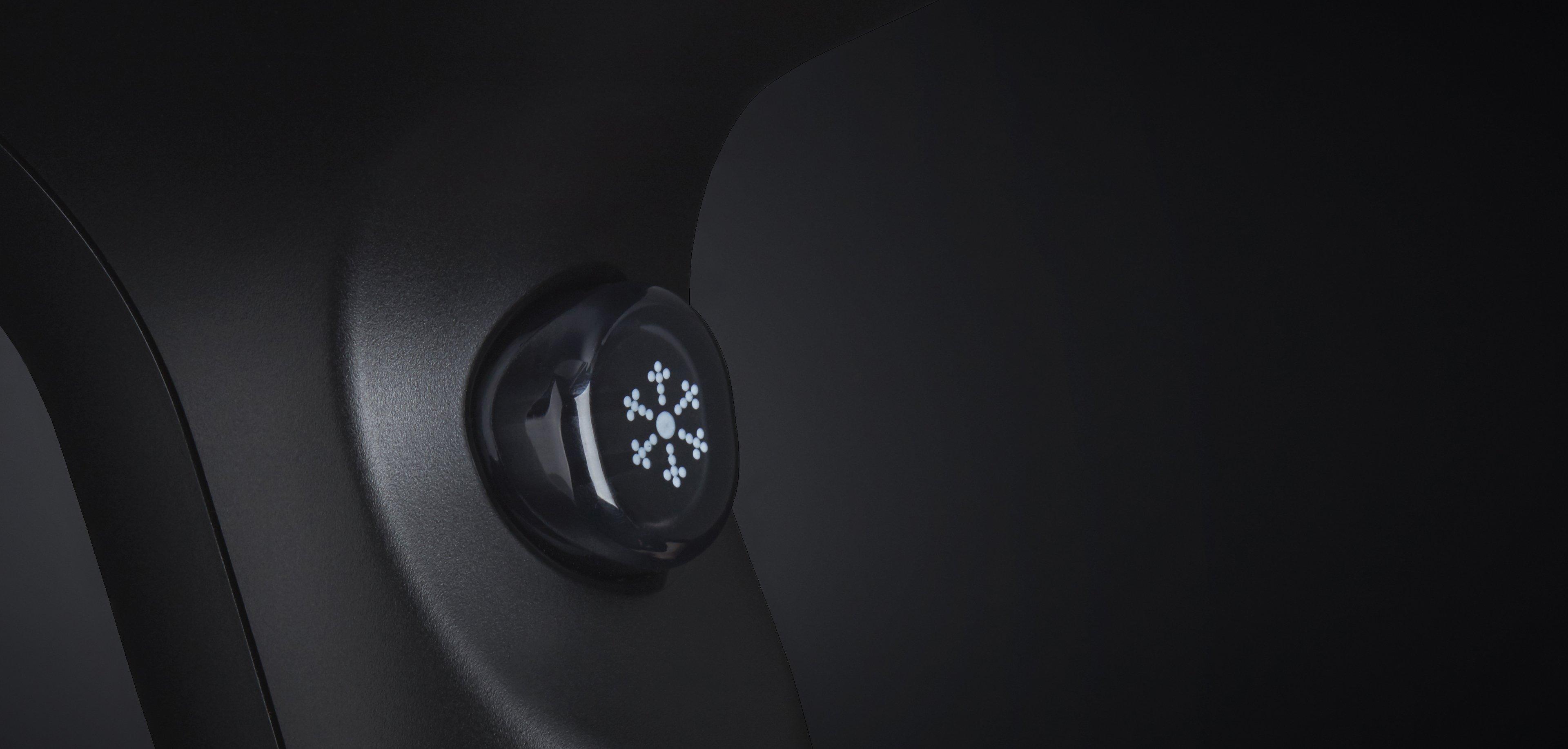 Helios hair dryer in black with close up  of cool shot button