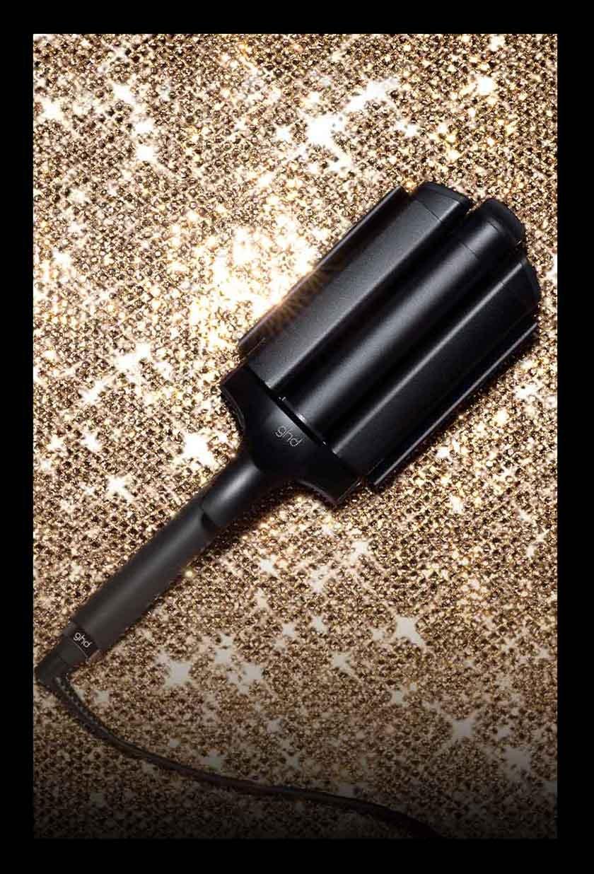 ghd wave Welleneisen vor gold glitzerndem Hintergrund