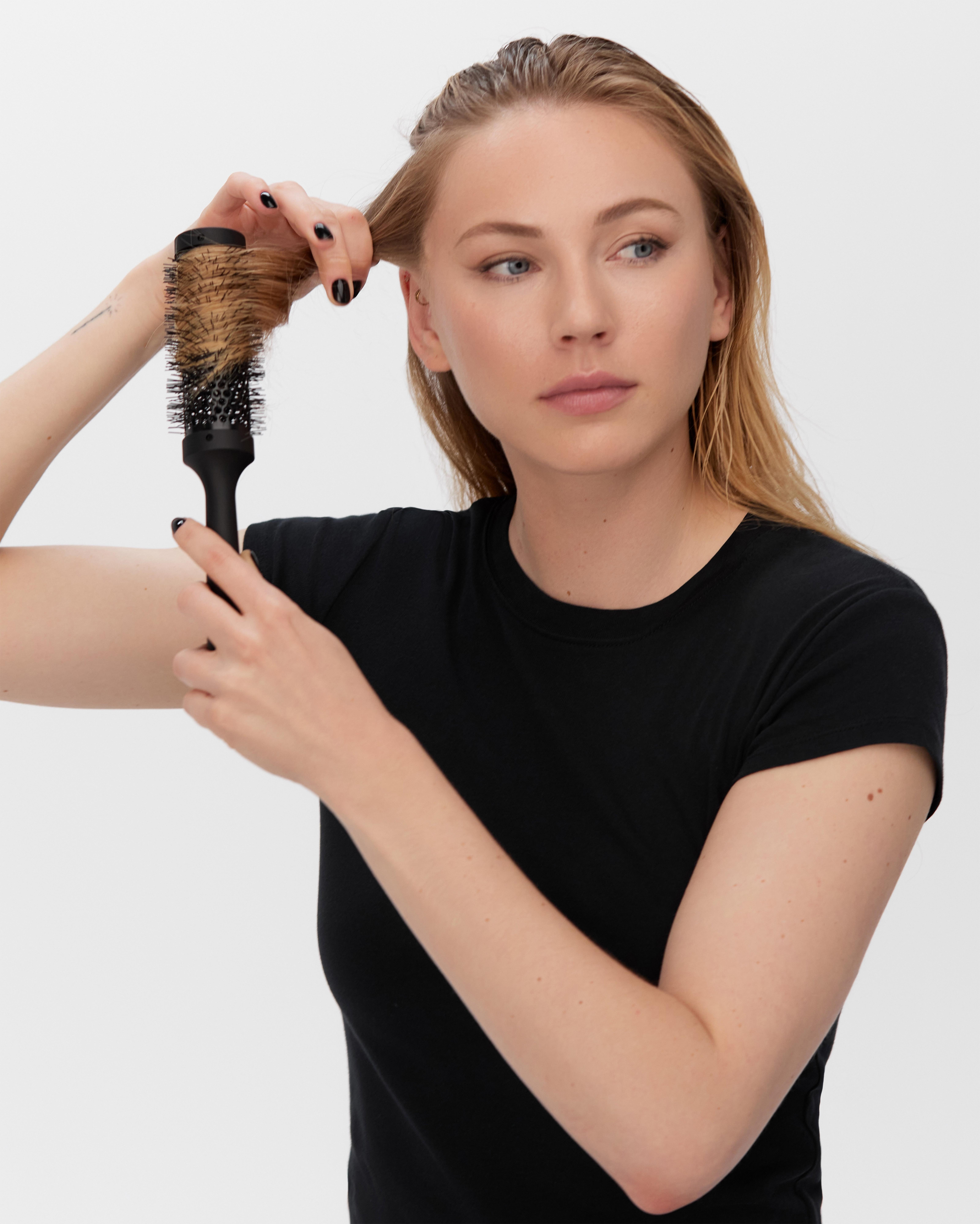 twist the hair from the brush