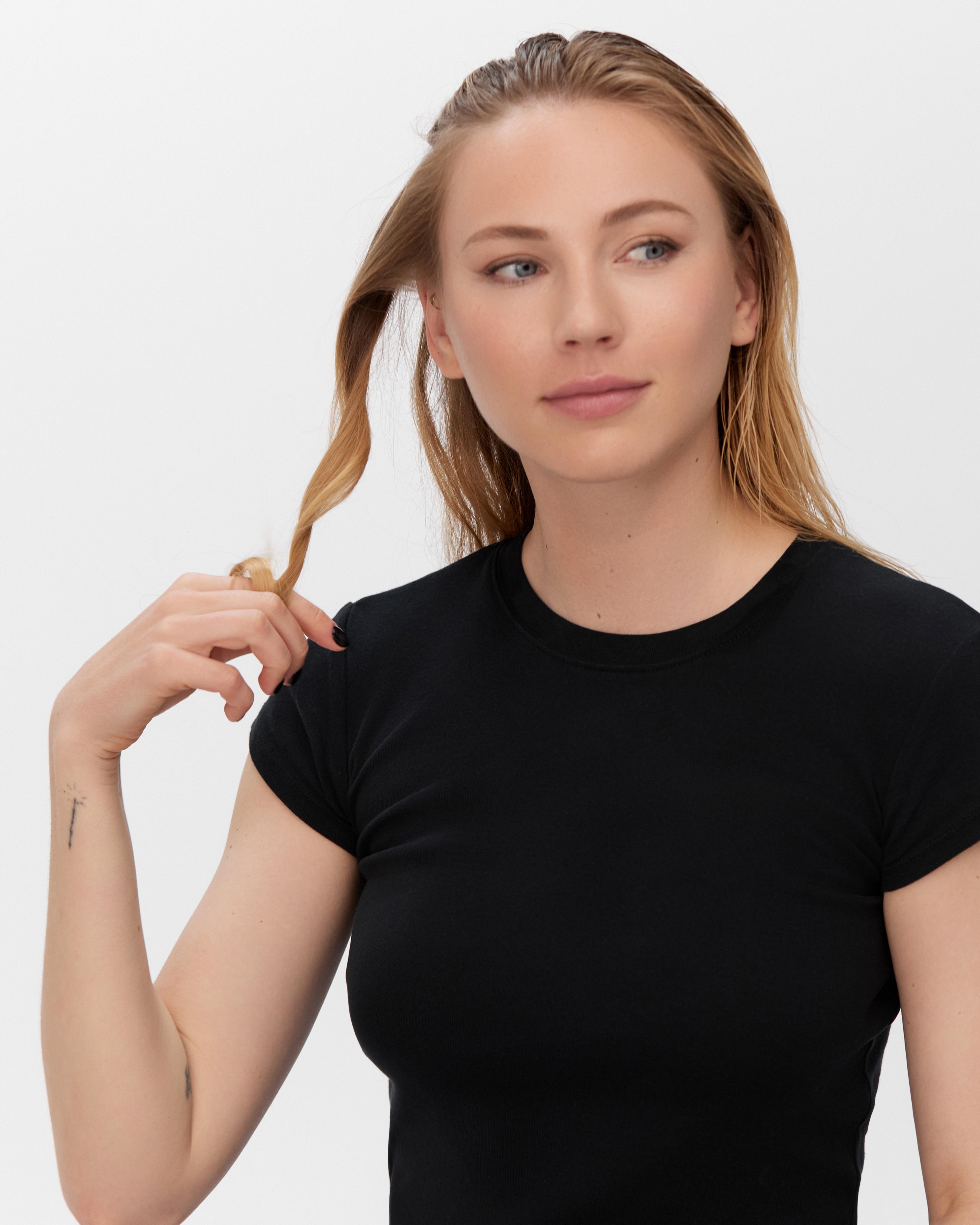 Twirl the hair away from the face