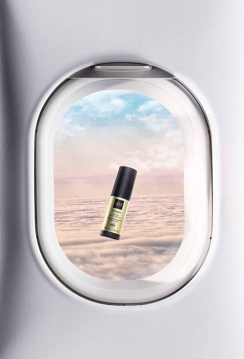 ghd bodyguard vor Flugzeugfenster